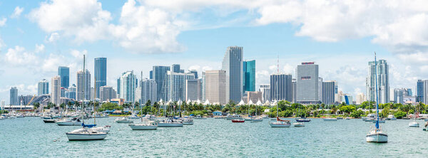 Miami, USA - September 11, 2019: Sailboats in Biscayne Bay with Miami Skyline