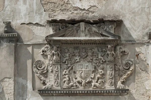 Coat of arms relief on facade of the Olesko Castle in Lviv Oblast in Ukraine