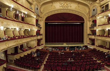 KYIV, UKRAINE - DECEMBER 13, 2017: The interior of The Taras Shevchenko Ukrainian National Opera House at the 13th of December 2017 in Kyiv, Ukraine, showing the stage and auditorium. clipart