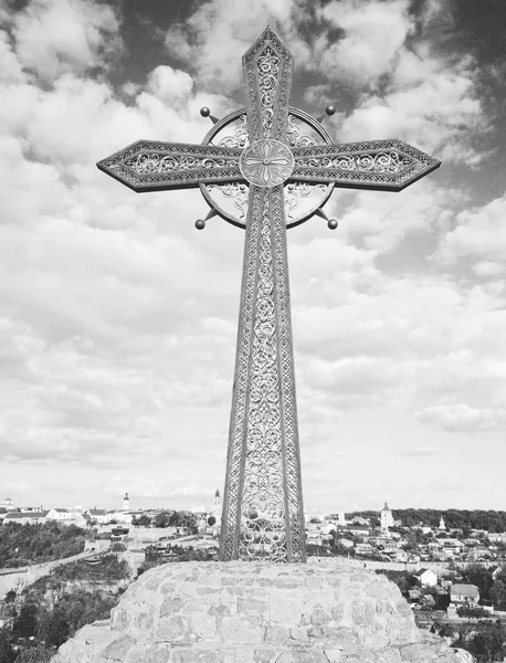 Orthodox cross against the background of Old City, Kamenets-Podolsky, Ukraine