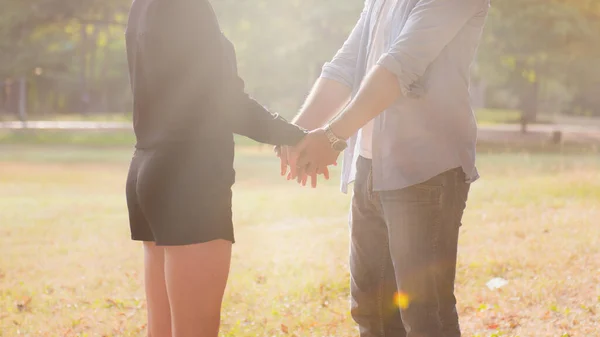 Young Couple Love Walking Autumn Park Holding Hands Looking Sunset — Stock Photo, Image