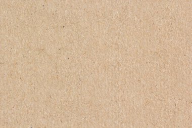 Doğal kahverengi geri dönüşümlü kağıt yüzeyinin kabataslak lif dokusu, tasarım, ambalaj veya dekorasyon için çevre dostu malzeme arka planı yakın plan.