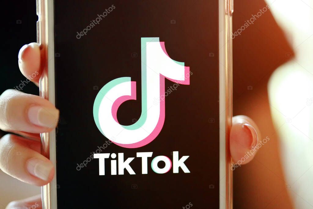 Nakhonratchasima, Thailand - May 31, 2020 : Tik Tok application information icon on Apple iPhone 8 close-up, which is a popular social media network is app to create and share videos on the internet.