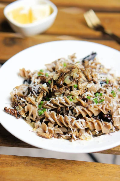 Crickets, Onions, Garlic, Lemon, and Cricket Pasta in a Picatta Sauce