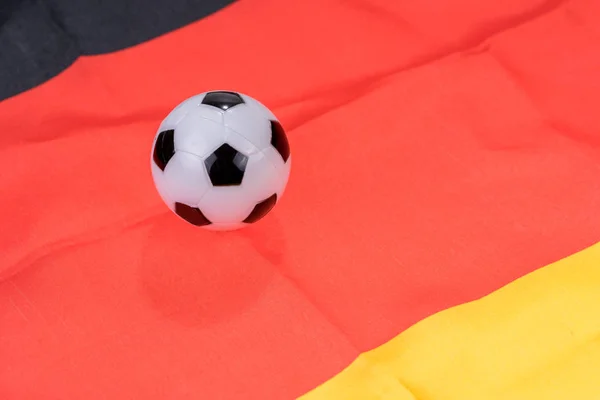 Football on Germany flag background. Football and Soccer Games