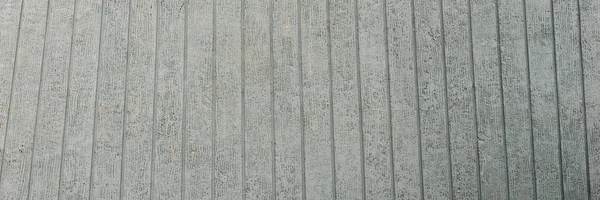 Çizgili gri beton duvar. Mimari arka plan