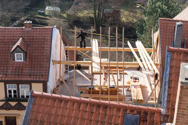 New wooden trusses, roof beams, frame house construction