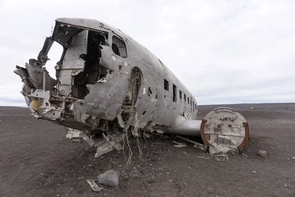 Plane wreck in iceland at a cloudy day with no people