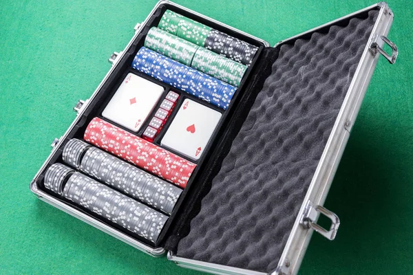 Poker set with cards, dice and chips in aluminum case