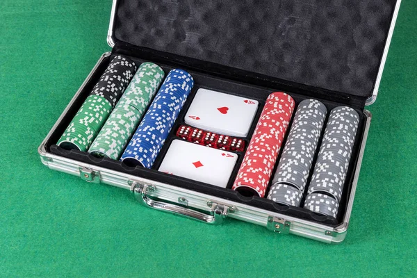 Poker set with cards, dice and chips in aluminum case
