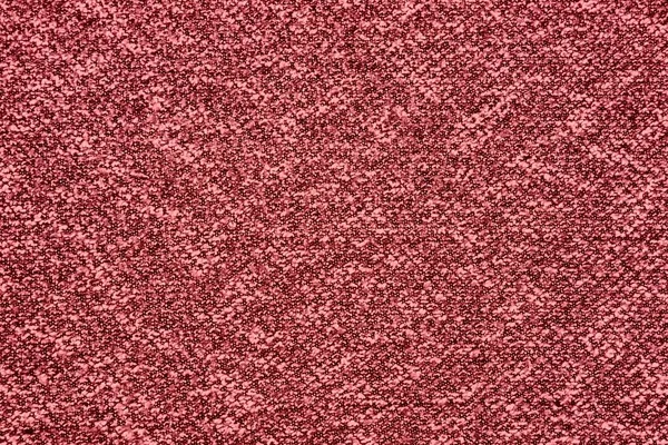 Red wool background with patterns. Red woolen fabric texture