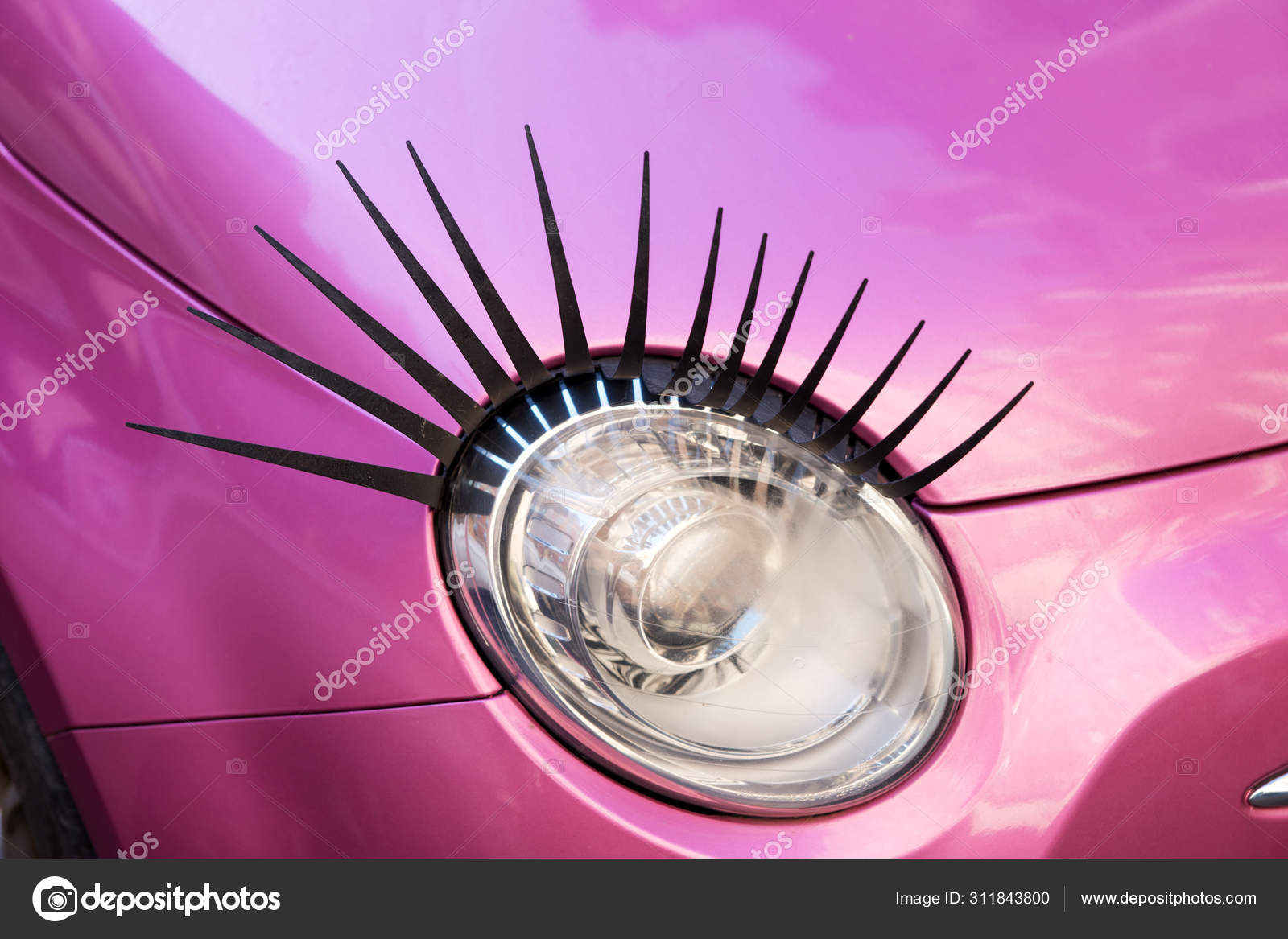 https://st4.depositphotos.com/2946501/31184/i/1600/depositphotos_311843800-stock-photo-pink-car-eyelashes-headlight-closeup.jpg