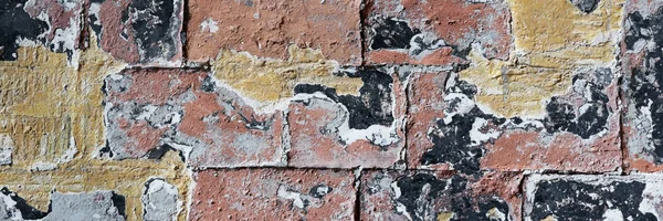 古いカラフルな着用レンガの壁の背景のパノラマ レンガのパノラマテクスチャ — ストック写真