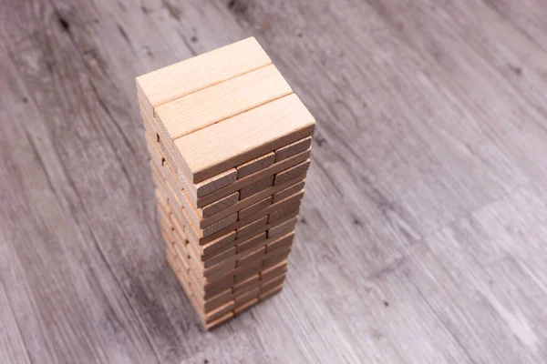 Tower Blocks Made Wooden Bricks Isolated Floor — Stock Fotó