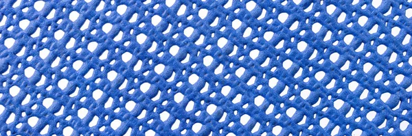 穴のある青いプラスチックの背景 パノラマブルーのパターン — ストック写真