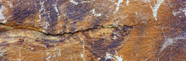 Panoramic image. Colored natural granite structure