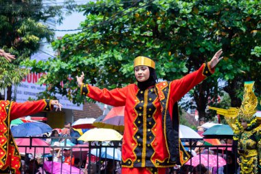 Moyo dance from Nias, North Sumatera. This dance symbolizes the movement of a flying eagle and the spirit of heroism and protection.