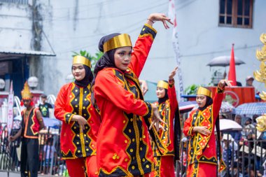 Moyo dance from Nias, North Sumatera. This dance symbolizes the movement of a flying eagle and the spirit of heroism and protection.