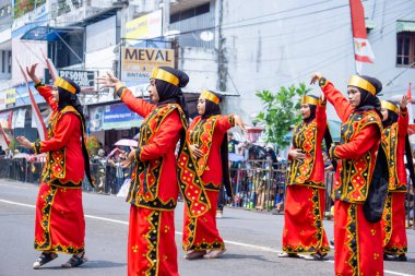Moyo dance from Nias, North Sumatera. This dance symbolizes the movement of a flying eagle and the spirit of heroism and protection.