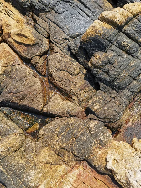 Background texture of some natural stone granite. multi-colored - red, gray. — Stock Photo, Image