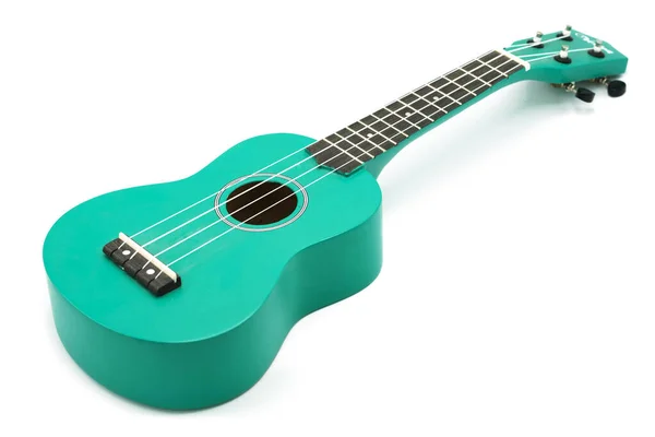 Ukulele isoliert auf weißem Hintergrund. Das Instrument ist eine kleine grüne Gitarre. — Stockfoto