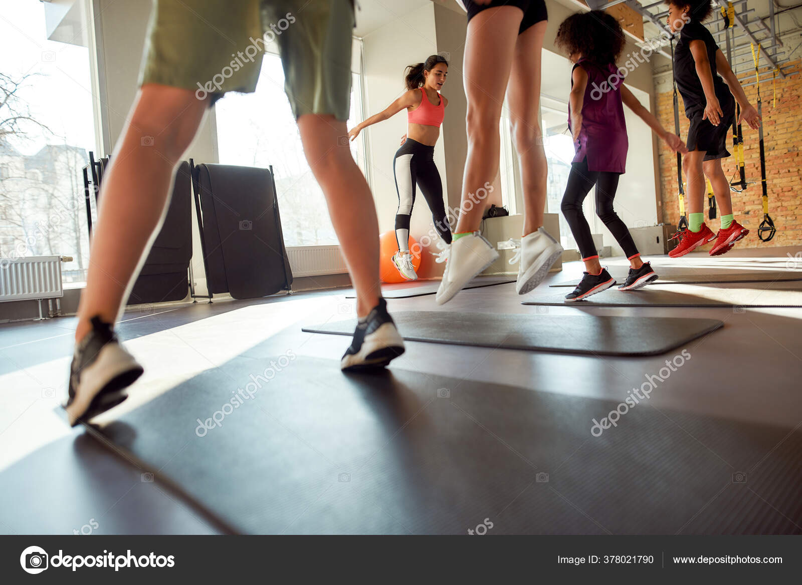 Fun fitness defined. Cropped shot of female trainer exercising