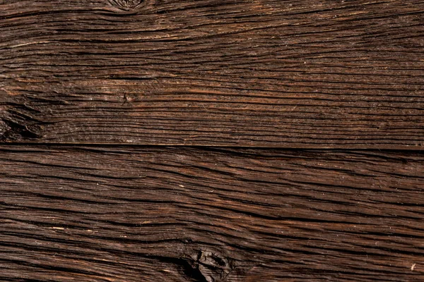 Темні дерев'яні дошки крупним планом фон — стокове фото
