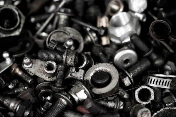 Close-up of used steel bolts background — Stock Photo, Image