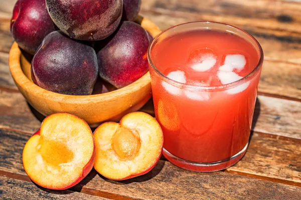 Close Juice Plumot Mix Plum Apricot Fresh Plumot Wooden Table — Stock Photo, Image
