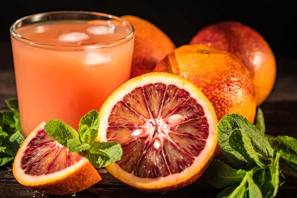 Glass of fresh blood orange juice, selective focus — Stock Photo, Image