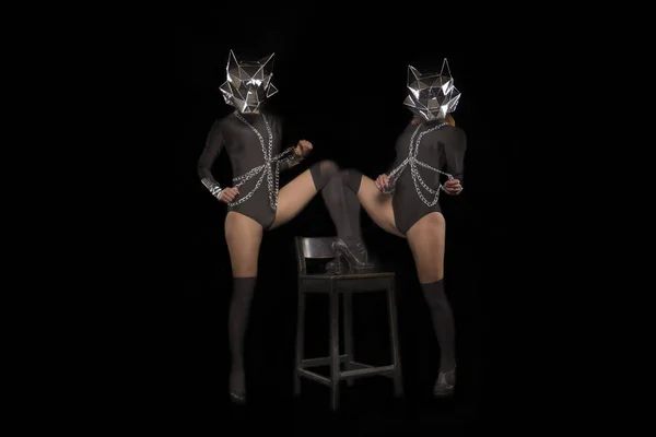 Two go-go variety show dancers in wolf masks — Stock Photo, Image