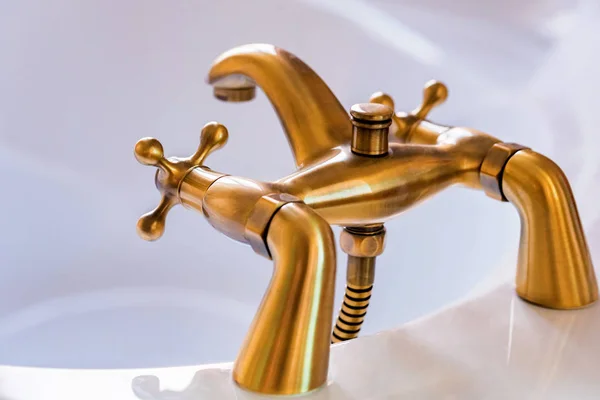 Modern brass or bronze tap for bathroom — Stock Photo, Image