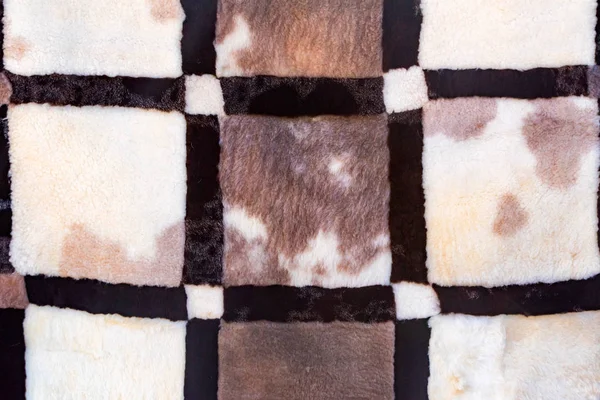 Tekstura futro dywan czarny, szary i biały, części z bliska — Zdjęcie stockowe