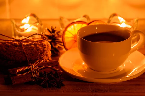 Cozy still life with tea, candle light and cookies — Stock Photo, Image