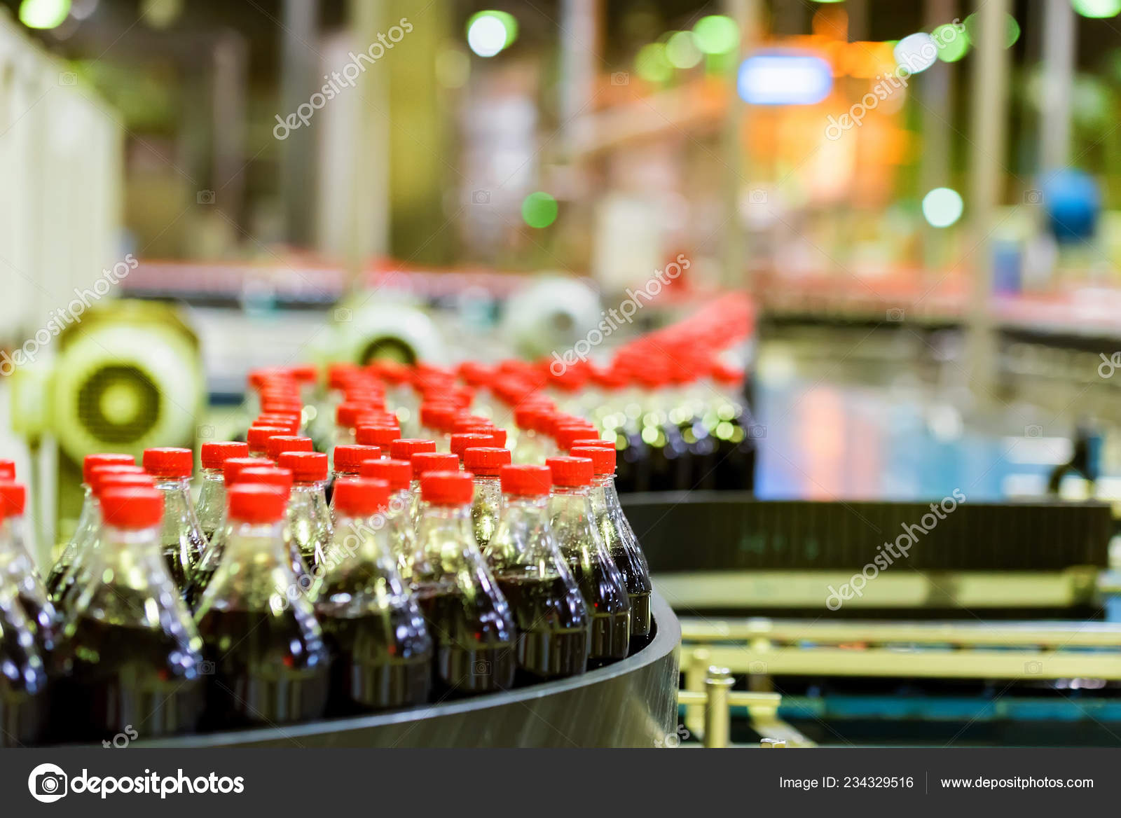 Soft drink bottling line at a factory Stock Photo by ©Yakov_Oskanov