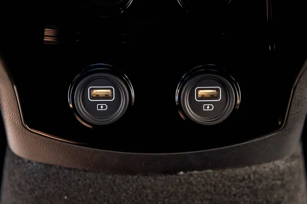 Close up of two car interior usb charging cable connection — Stock fotografie