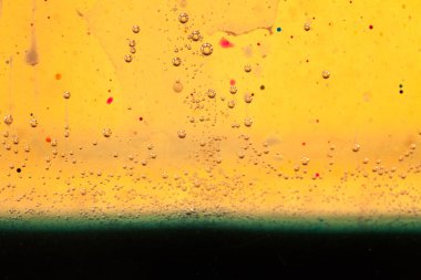 Yağ, su ve renkli mürekkep karışımı ile soyut kompozisyon. Kirliliği kavramı