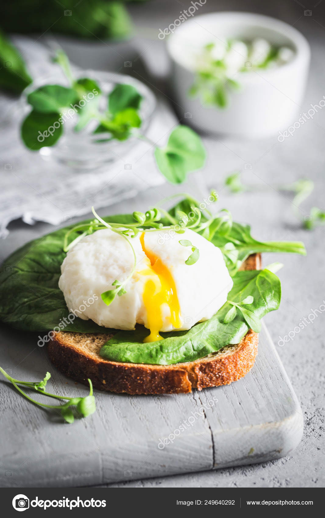 Sandwich with poached egg Stock Photo by ©KaterynaSednieva 249640292