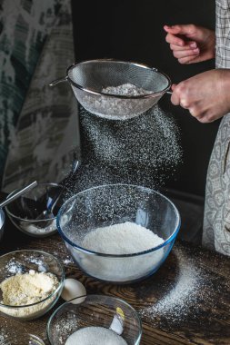Pouring flour