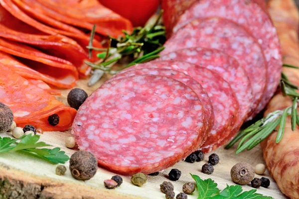 Sliced Salami Sausages Wood Table Close Royalty Free Stock Photos