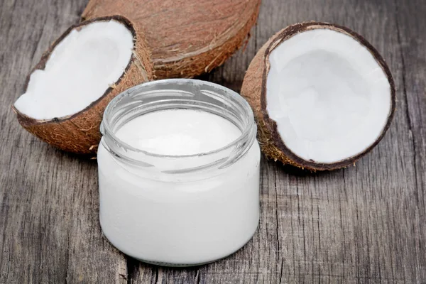 Óleo Coco Jarro Frutas Coco Velha Mesa Madeira — Fotografia de Stock