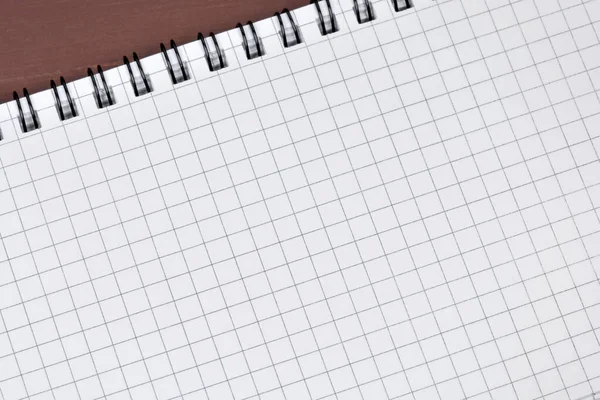 Close up of math notebook on a white background