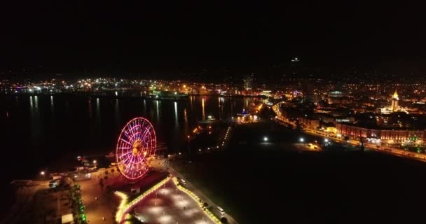 Paisaje Urbano Con Edificios Iluminados Por Noche Noria Batumi — Vídeos de Stock