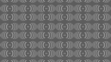 Siyah beyaz desenli, stroboskopik ve hipnotik etkiye sahip grafiksel desen, boyutu artarken ve sonra 16: 9 video biçiminde küçültürken,