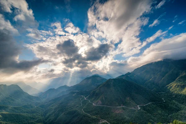 The magical sunset on O Quy Ho mountain pass before sunset. O Quy Ho Mountain Pass (Sapa, Vietnam) is Vietnam\'s longest mountain pass.