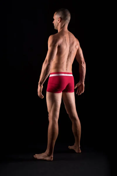 Sportlicher Mann Unterwäsche Ganzkörper Rücken Schwarzer Hintergrund — Stockfoto