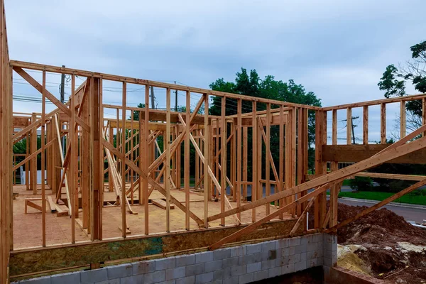 Wood Building frame at Multi-Family Housing Construction Site post and beam construction
