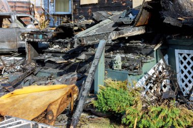 Detail arson from a home that was abandoned after house fire. clipart