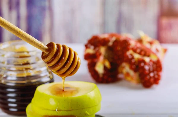 stock image Jewesh holiday shofar, torah book, honey, apple and pomegranate rosh hashanah traditional holiday symbols.