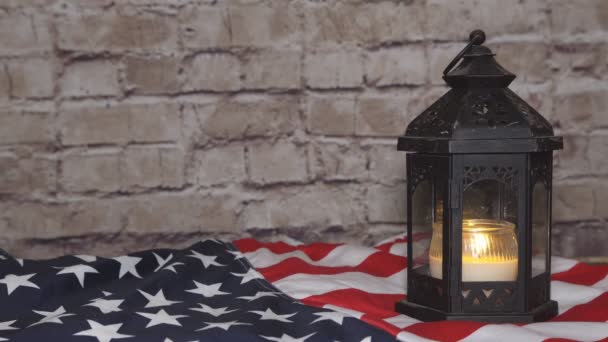 Flag of the United States and lighted candles, background — Stock Video